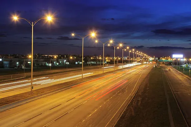 montreal-illuminated-highway-at-night.webp